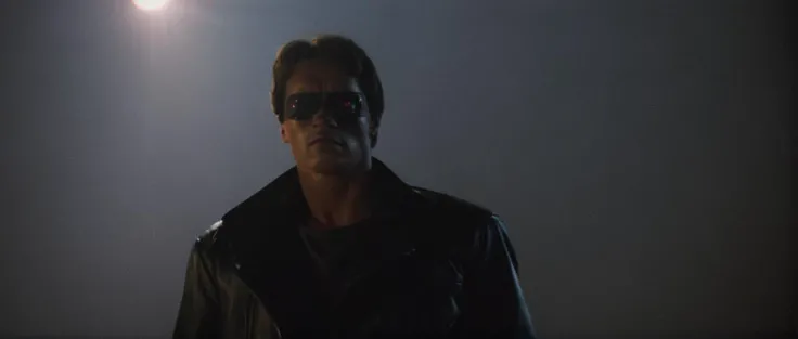 cinematic film still of  <lora:Terminator style:0.8>
In the 1980's Terminator a man with a black face and black eye,solo,black hair,1boy,jacket,male focus,black jacket,sunlight,portrait,realistic,leather,sad,leather jacket , horror themed, dark themed, low key light, dramatic light, dramatic shadow light, contrast, cinematic color, cinematic look, filmic, realistic, realism, perfection, perfect, Kodak, Kodak film, movie still, Terminator style, The Terminator 1984 Film style, shallow depth of field, vignette, highly detailed, high budget, bokeh, cinemascope, moody, epic, gorgeous, film grain, grainy