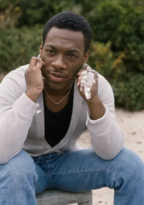 <lora:eddy_murphy_v1.0:1> ddmrph, (sharp focus:1.2), photo, attractive young man, (handsome face:1.1), detailed eyes, (muscular body:1.2), wearing (1980s clothes:1.2) on a (beach:1.2). (moody lighting:1.2), depth of field, bokeh, 4K, HDR. by (James C. Christensen:1.2|Jeremy Lipking:1.1).