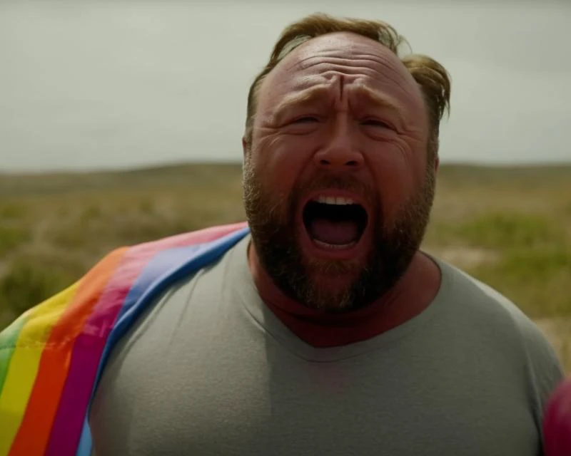 movie still of alexjones person wearing a tight rainbow flag jumpsuit, low wide angle shot carrying an alien baby on an alien spaceship with cyborg alien women color film still from Leviathan. screaming at the camera , by Kent Monkman. Helping poor people ((crying)) (tears), <lora:Alex Jones - Trigger w Alexjones Person:1>