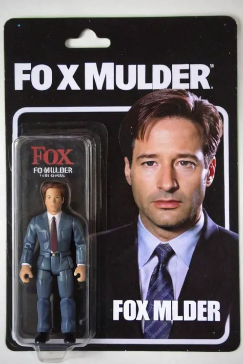 a toy of FBI agent fox mulder from the TV show x-files, the name 'Fox Mulder' is printed in bold letters, <lora:gonza:0.7>