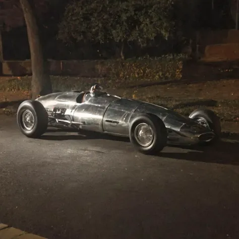 1960s Formula One car in Brooklyn Heights, night photo, beautiful reflections, moonlight rays