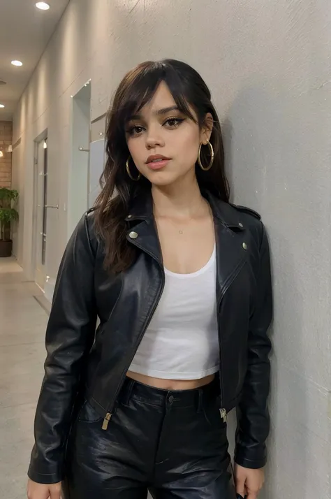 jenna_ortega wearing leather jacket with leather pants, long hair, eyeliner,
hoop earrings, lipstick, 
upper body, solid wall background,
<lora:JennaOrtega_Rebirth:0.8>