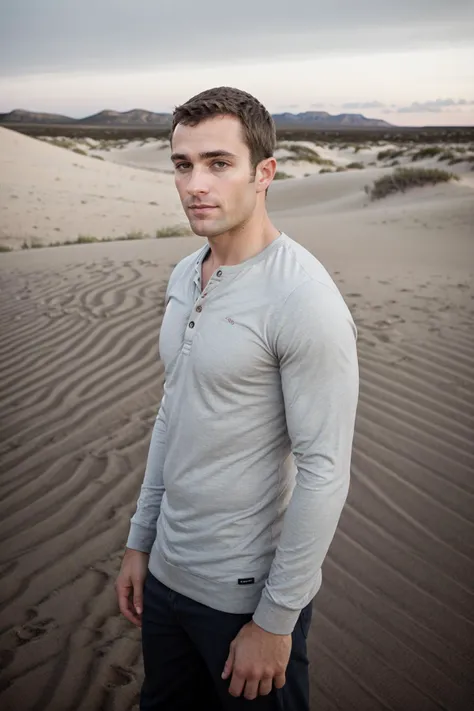 (medium shot:1) photo of man sc_walker <lora:sc_walker_sfw_00001:0.75> wearing a thin, fitted Henley shirt posing next to a sand dune in Wyoming, windy, Twilight, right after sunset, soft and dusky blue ambient light from the setting sun casts a serene glow on the dunes, (Peter Lindbergh), ethereal, contemplative, and introspective, solitude, minimalistic accessories, (sand blowing), dynamic pose, (distant cityscape:1), (from the side)