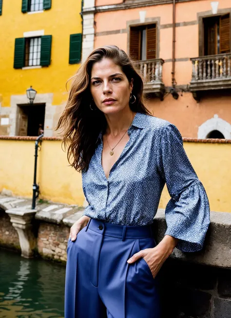 A stunning intricate full color portrait of (sks woman:1) in Florence, at the Ponte Vecchio, wearing Bell-sleeve blouse and culottes, epic character composition, sharp focus, natural lighting, subsurface scattering, f2, 35mm, film grain, , by David LaChapelle, <lora:locon_selmablair_v1_from_v1_64_32:1>