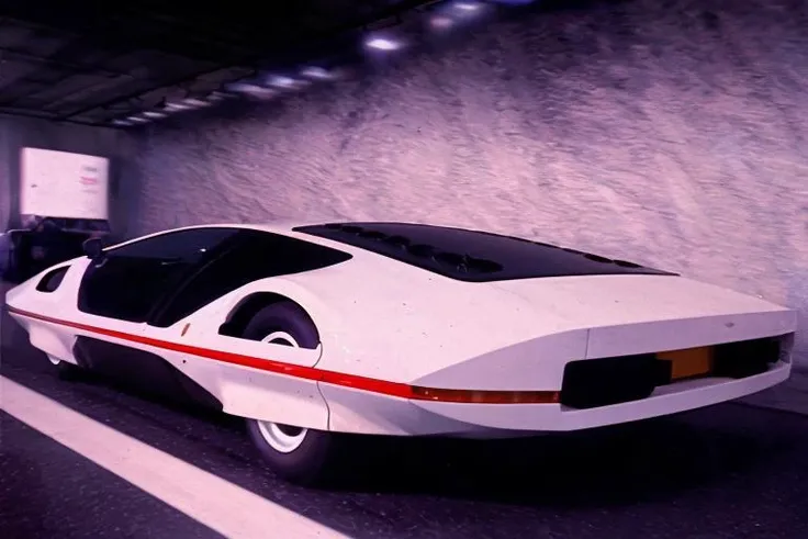 analog gloomy photo of a Ferrari Modulo car, <lora:f3rr4r1m0dul0:1>, racing down an avenue in a futuristic city at night, dystopian, ((cyberpunk)), ((nighttime)), High Detail, Sharp focus, ((photorealism)), realistic, best quality, 8k, award winning, dramatic lighting, epic, cinematic, masterpiece, depth of field, volumetric lights, dutch angle, lens flares,