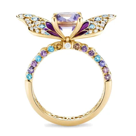 An 18k gold ring with slender and dynamic arms for women, in a Victorian style with hand-painted effect. The ring is shaped with butterfly elements, the main stone is set with purple colored gemstones, the butterfly wings are partially enameled with hollow windows,and the colors are a dreamy blue and purple gradient