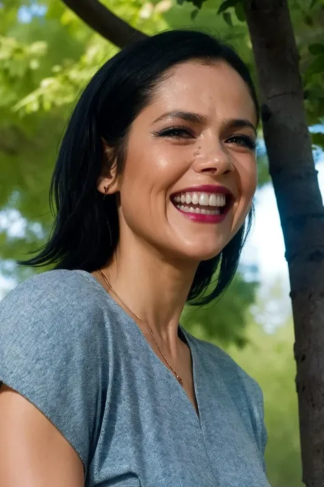 portrait of a woman in blue tee, outdoors, laughing, bold, bright colours, (high detailed skin:1.1)
<lora:lily_cowles_lora_v01:1> lilycowles, mole, short black hair