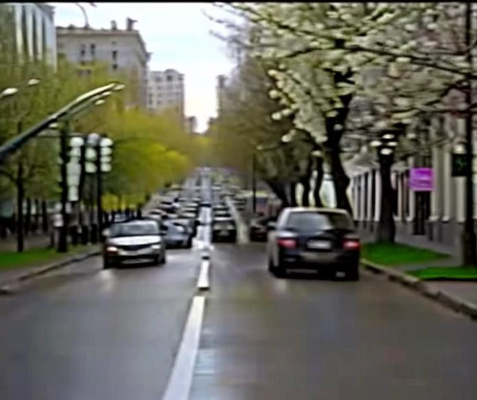 moskva_xxi, city street, teenager, vhs, traffic, spring, bloom
<lora:moskva_xxi:1>
<lora:style_ VHS3:0.95>