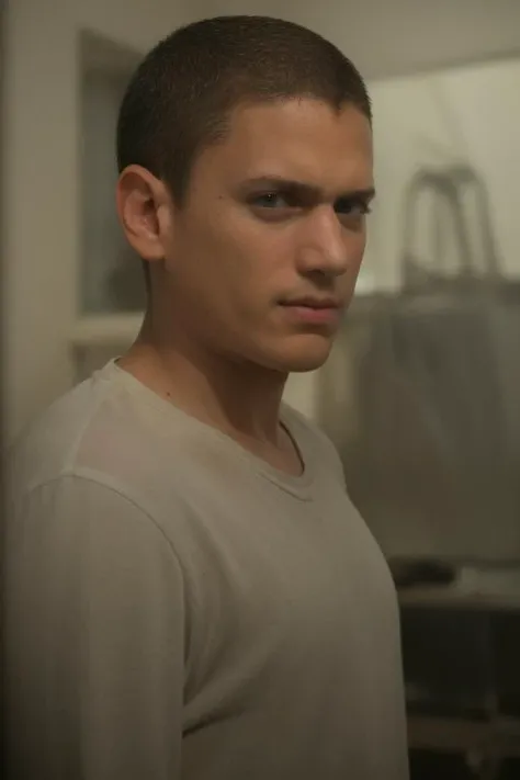 portrait, w3nm1l, handsome man, stunning eyes, upper body, short hair, buzz cut, in t-shirt, at the exotic aquarium, facial focus, amateur, candid
