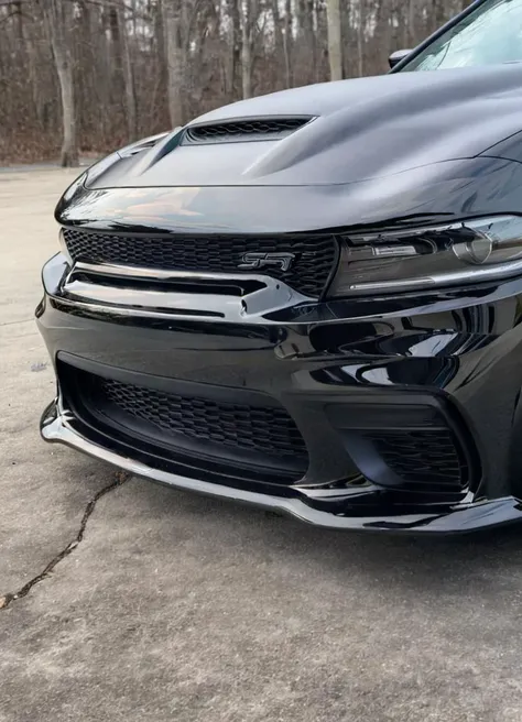 black chargerhellcatsrt seen from a very low angle, parked, front view,
<lora:ChargerHellcatSDXL:1>