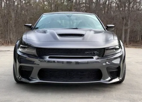 black chargerhellcatsrt, parked, front view,
<lora:ChargerHellcatSDXL:1>