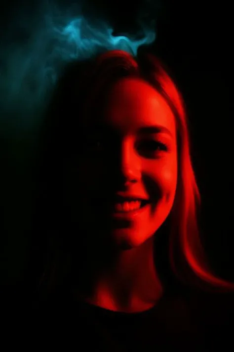 close up, front view, detailed face
looking at viewer, Wardrobe
woman, cute smile, thick eyebrows, looking at viewer, model backlit, 
dark shadow over the face.
Black Background
dark Contrast,
Dark room
Dark Background,
Dark Color,
Dark Image,
Dark Theme,
Dim,
Expired Film,
Film Grain,
Hyper Shadow,
Hyper Smoke,
Kodak Portra 800,
Lowkey,
Night,
Shadows, 
Laser Lights
LED Panels
Black Lights (UV)
Neon Lights
LED Strip Lights