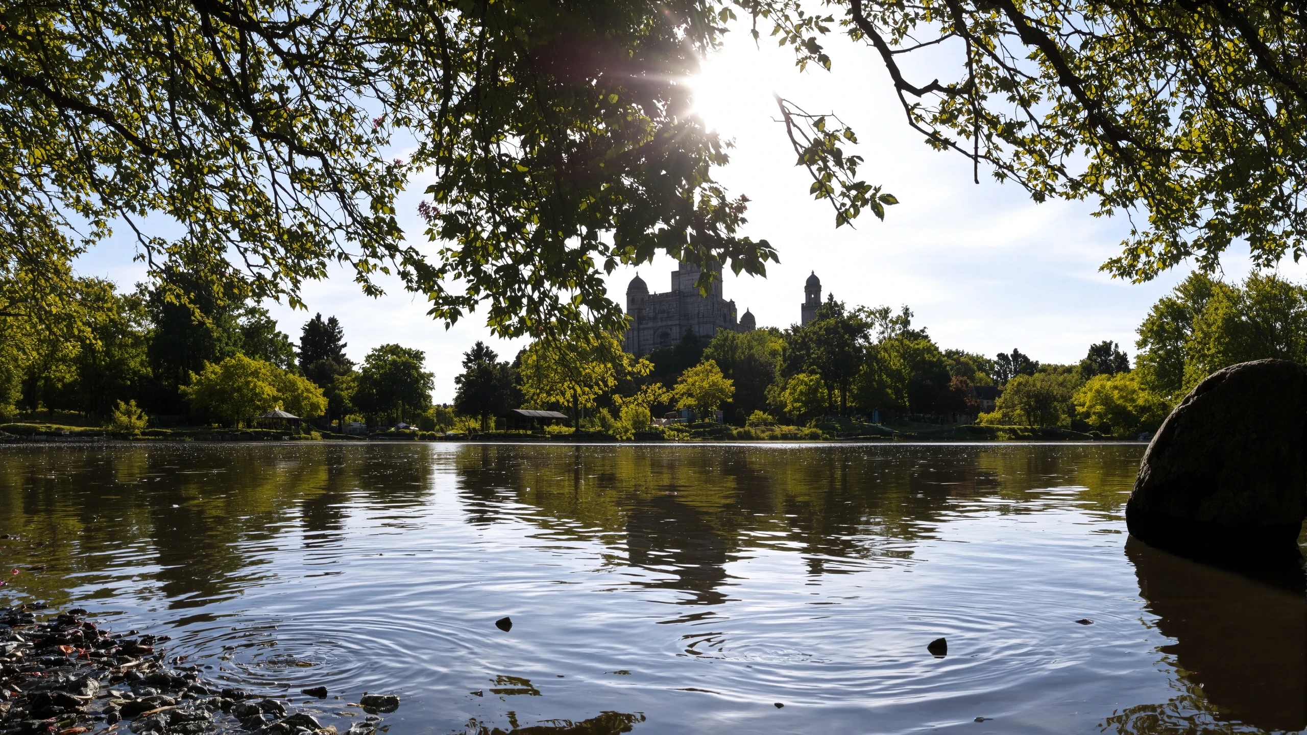 (beautiful fantasy landscape), ((very detailed)), sharp focus, big rock, (water ripples) reflections, castle, river (pond),medieval forest, ((village)), stunning nature aquatic environment , medieval land, (bright sunny sky), (high contrast), cinematic (lights), backlight, (shadows), lens flare, vibrant colors, colorful, Copper flowers and leaves, (lovely), (beautiful), <lora:Detail Tweaker LoRA add_detail:1><lora:depth_of_field_slider_v1:5> <lora:no-blur:0.8>