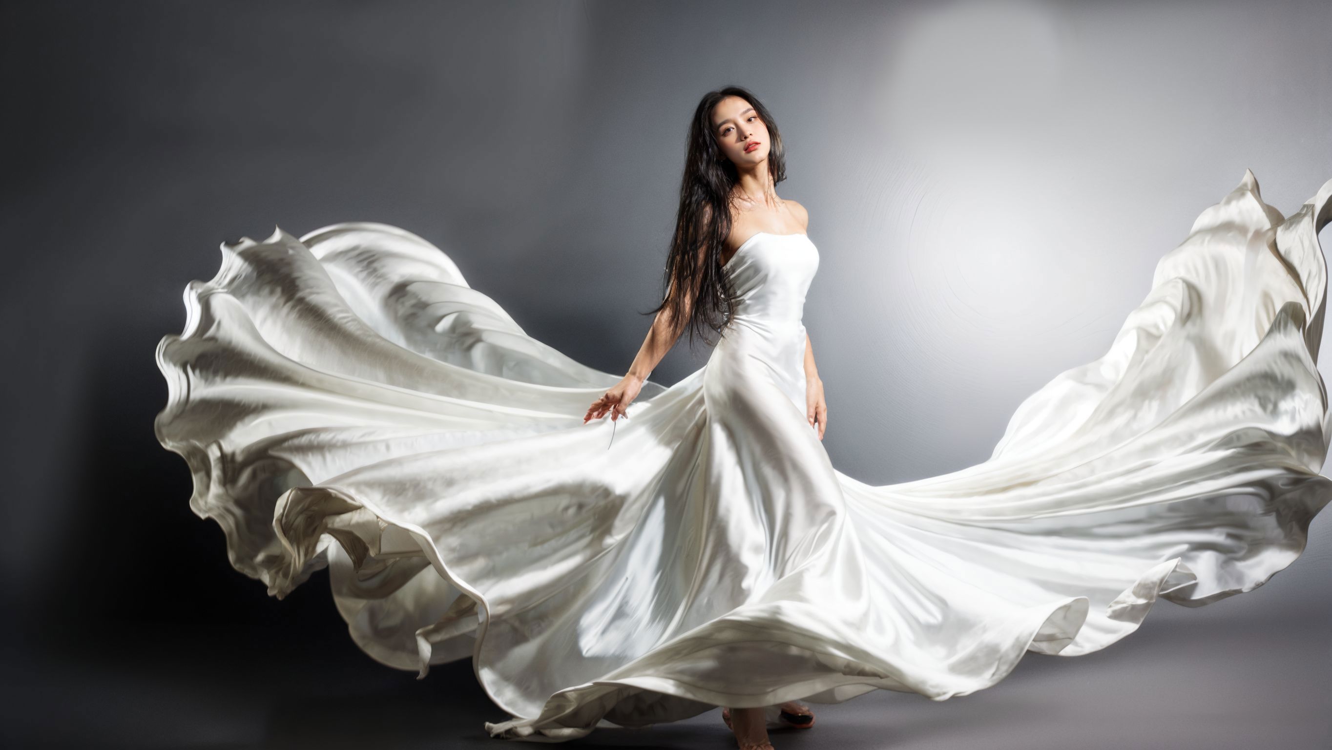 A woman in a white dress is dancing with her long flowing dress - SeaArt AI