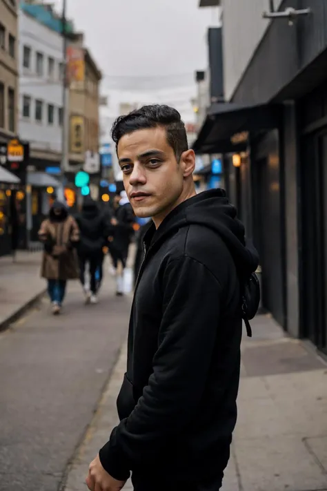 male,realistic,<lora:rami_malek:0.7>,rami_malek,in center of city,wearing black hoodie