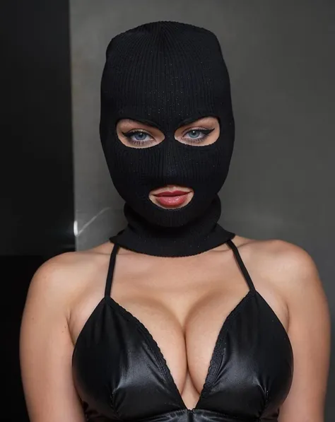 <lora:Female_Balaclava:0.7>, masterpiece, best quality, closeup, woman wearing a black balaclava mask, lipstick, cleavage, blue eyes, intricate detail, atmospheric, dramatic