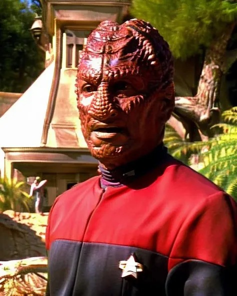hirogen, alien man, male, leathery bumpy skin, black eyes, slight smile, wearing red voyunf uniform, front view, outdoors, in paris, (medium shot:1.3), centered subject, <lora:hirogen_lora:0.7> <lora:Voyunfv1:0.8>