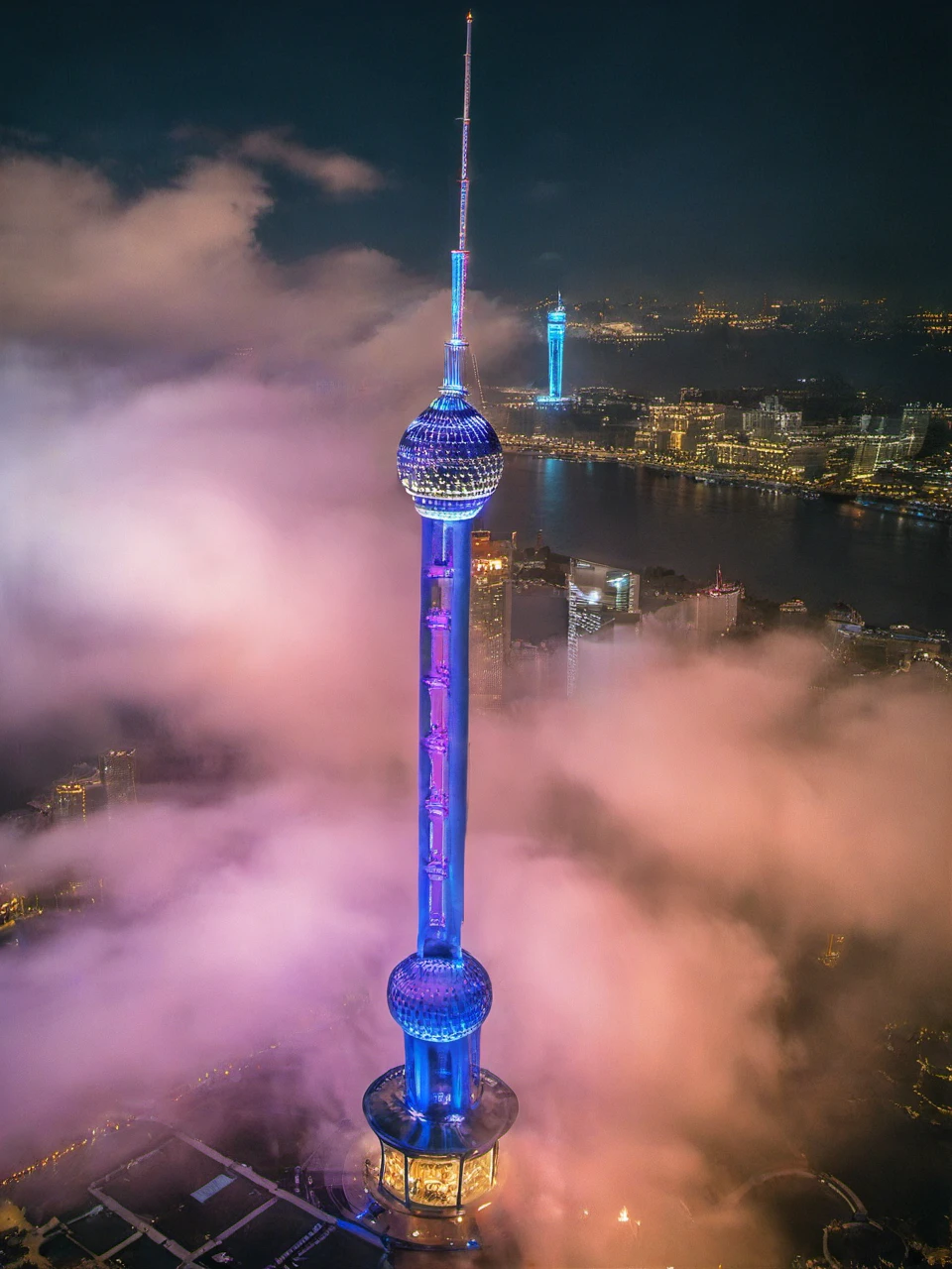 realistic, aerial photograph, cloud, tower, night, neon light, fireworks<lora:ap1-000024:0.8>
