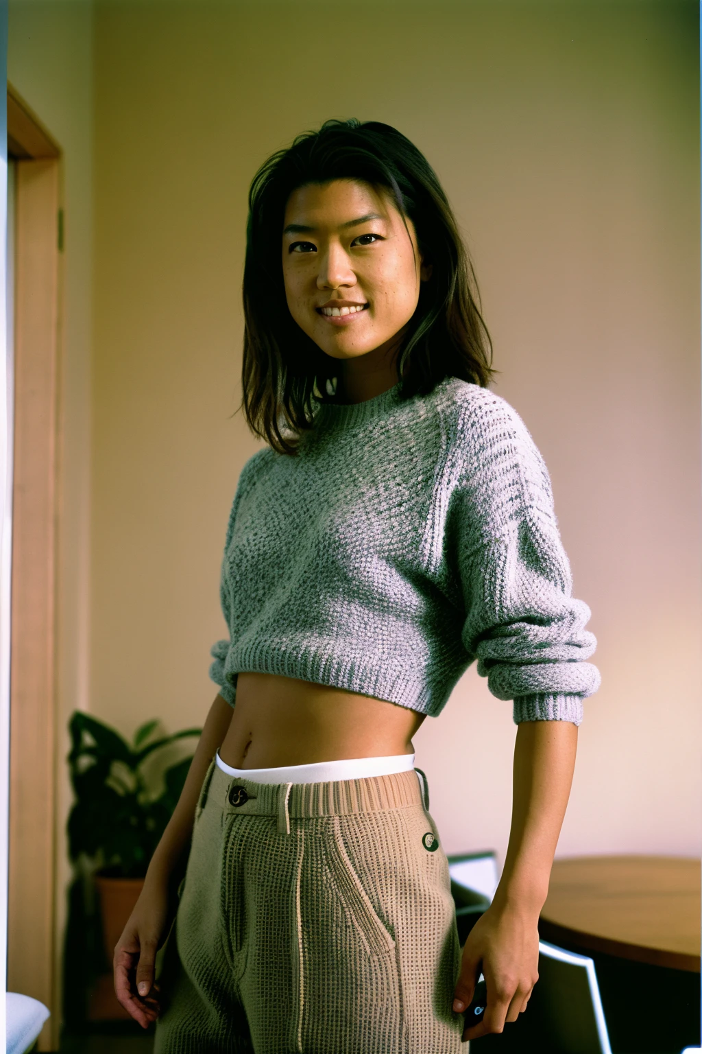disposable camera photo, 1girl, gracepark, sweater, pants, skin detail, smile, indoors, perfect lighting <lora:GracePark:1>
