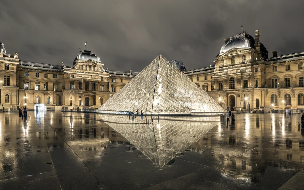 the louvre at night