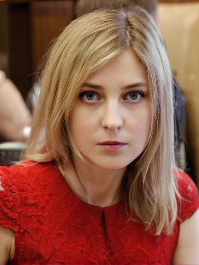 a beautiful picture of natpok, masterpiece, photorealistic, woman, detailed face, 4k, light, RAW color photo,(fully in frame:1.1), detailed skin texture, (blush:0.5), (goosebumps:0.5),pale blonde hair,(paris:1.2) restaurant,wearing a red dress<lora:natpok2:1>