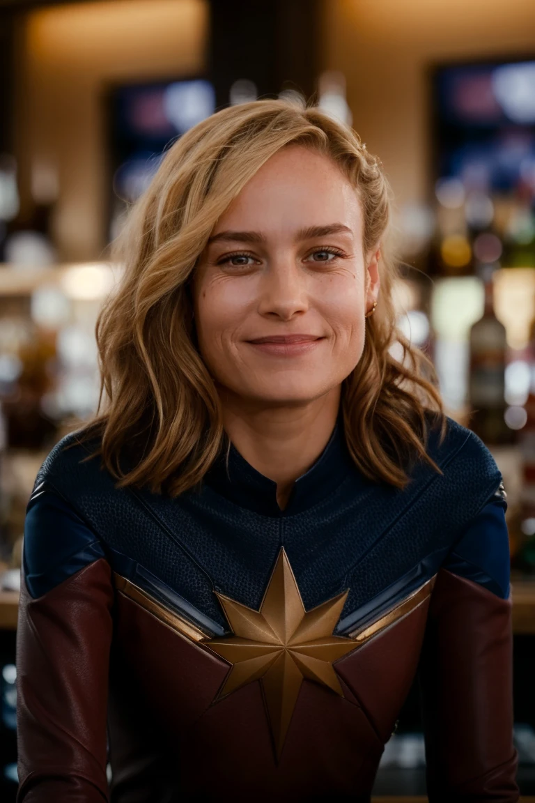 1girl, solo, portrait, sitting at a bar, smile, (looking at viewer:1.2), focus on face, blurry_background, bokeh, chromatic_aberration, depth_of_field, female focus, photorealistic, soft colors, masterpiece, high quality, (high detailed skin:1.1)
 <lora:captain_marvel_tm_lora_v01:1> marv3l, n3wst