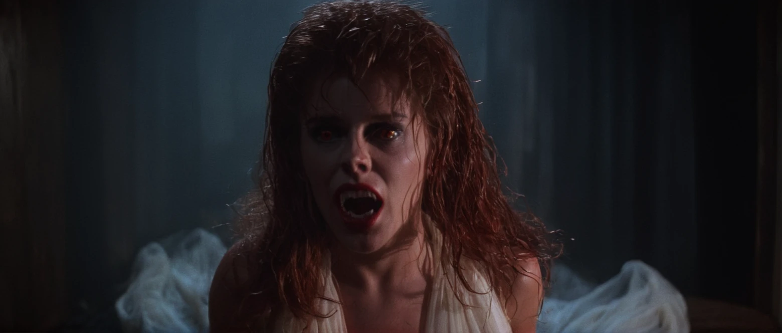 cinematic film still of <lora:Amy Peterson:0.9>
Amy Peterson, afraid, scared of something, surprise look on face, In the 1980's Vampire1 Amy,White Fangs Teeth,Lipstick,long messy wet hair,reflecting eyes,nipples,transparent sleeveless scarf dress a woman with red hair and a white dress,1girl,solo,long hair,looking at viewer,open mouth,brown hair,upper body,teeth,blurry,parody,realistic,horror (theme) , Horror themed, dark themed, Fright Night 1985 style, shallow depth of field, vignette, highly detailed, high budget, bokeh, cinemascope, moody, epic, gorgeous, film grain, grainy