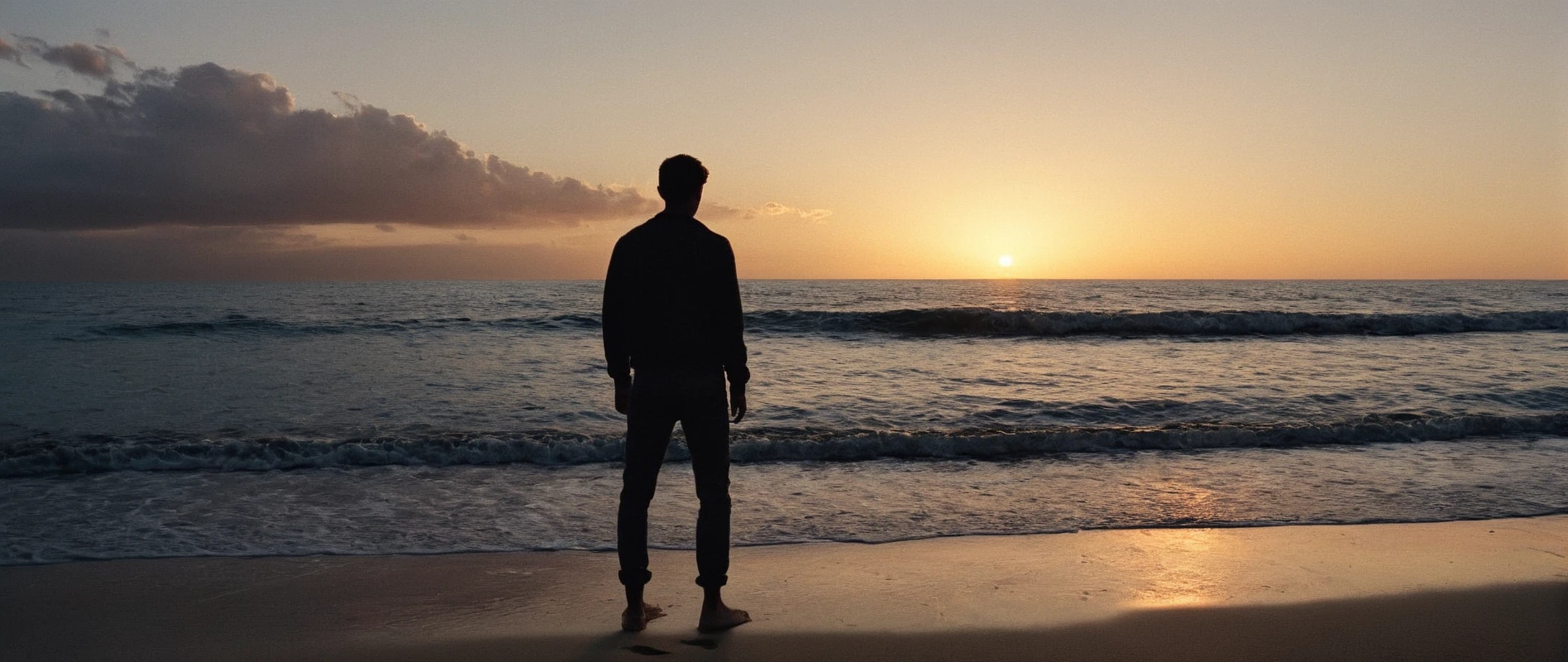 UHD, 4k, ultra detailed, cinematic, a photograph of <lora:Film Grain style:0.6> Film Grain:1 style
 <lora:Kodak Motion Picture Film Style v4:0.4>
 <lora:Chiaroscuro Lighting Style:0.6>
 <lora:Ron Fricke style:0.4>
dramatic, cinematic, shadow, partially covered in shadow, a person standing on a beach looking at the ocean Chiaroscuro Lighting Style, solo, 1boy, standing, male focus, outdoors, pants, water, from behind, ocean, beach, scenery, sunset, sand, horizon, silhouette, wide shot, waves, shore, epic, beautiful lighting, inpsiring