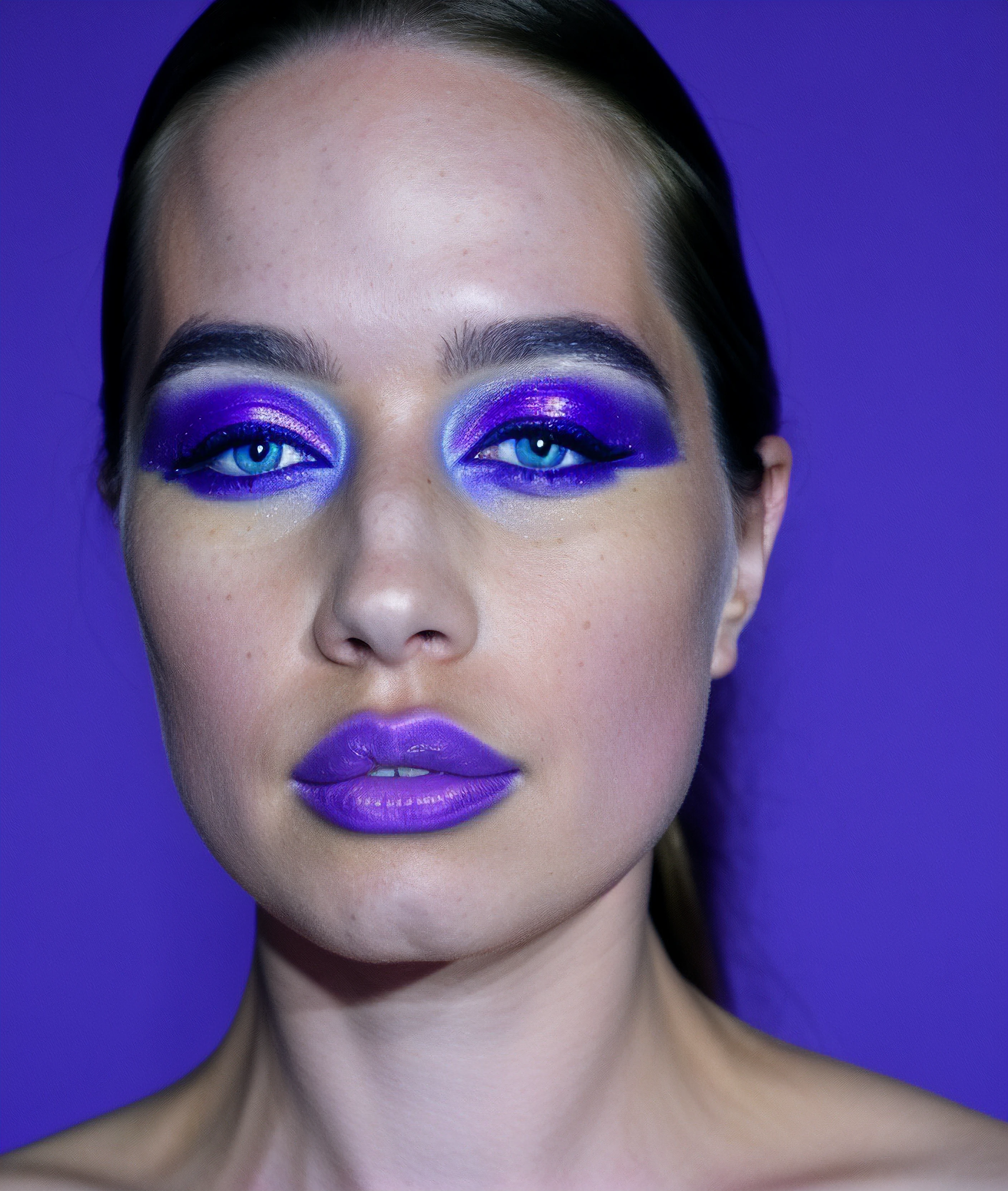 professional glamour photograph of apopp, (purple skin), solo, High Fashion model girl face in colorful bright UV lights in studio, portrait of beautiful woman with trendy make-up and manicure. Art design, colorful make up. Over colourful purple, blue background, pores, masterpiece, <skinhairdetail>