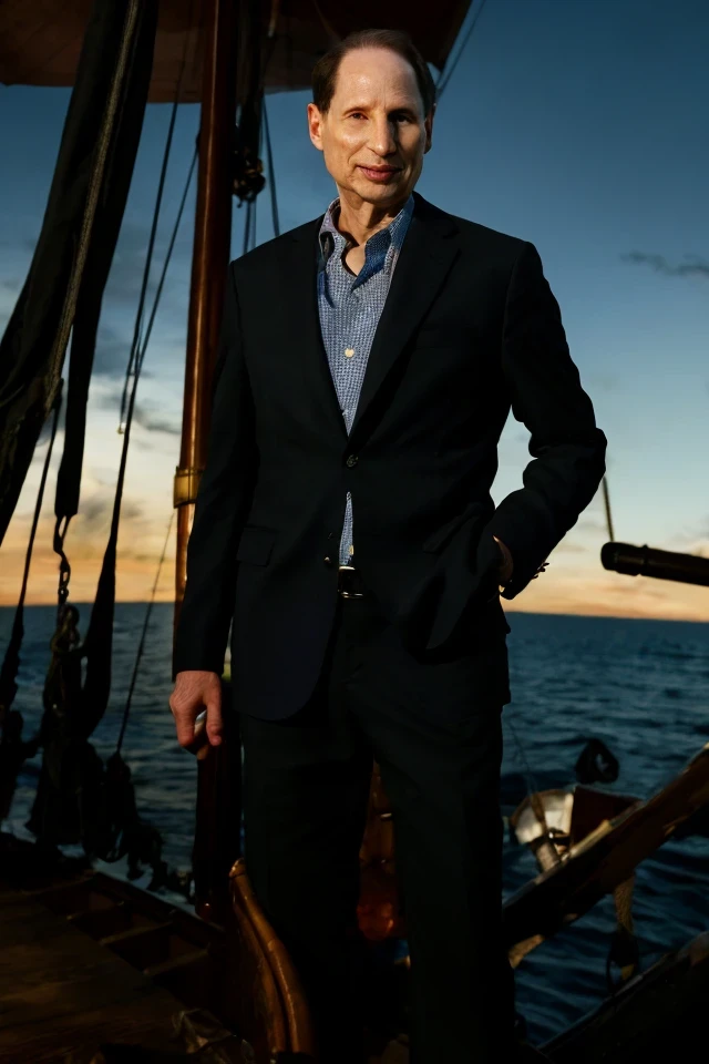 ron wyden <lora:senate_073_ron_wyden:0.65> , face closeup, face focus, shirt, formal, suit, collared shirt, white shirt, jacket,
Clad in a pirate outfit with an eyepatch, standing on a pirate ship with a Jolly Roger flag in the background, "Treasury Hunt",
best quality, masterpiece, HDR, professional, studio quality, highres,