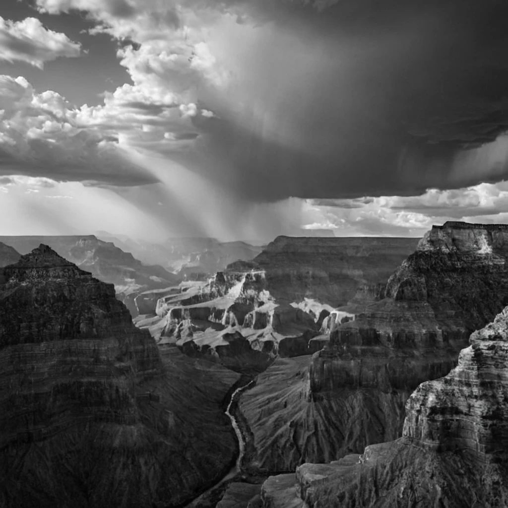 a (black and white:1.5) photo of the Grand Canyon, layered rock formations, dramatic clouds fill the sky, dramatic light, high contrast, extreme details, intricate details, 8k, 35mm photo, photorealism, realistic photo, national geographic style, masterpiece