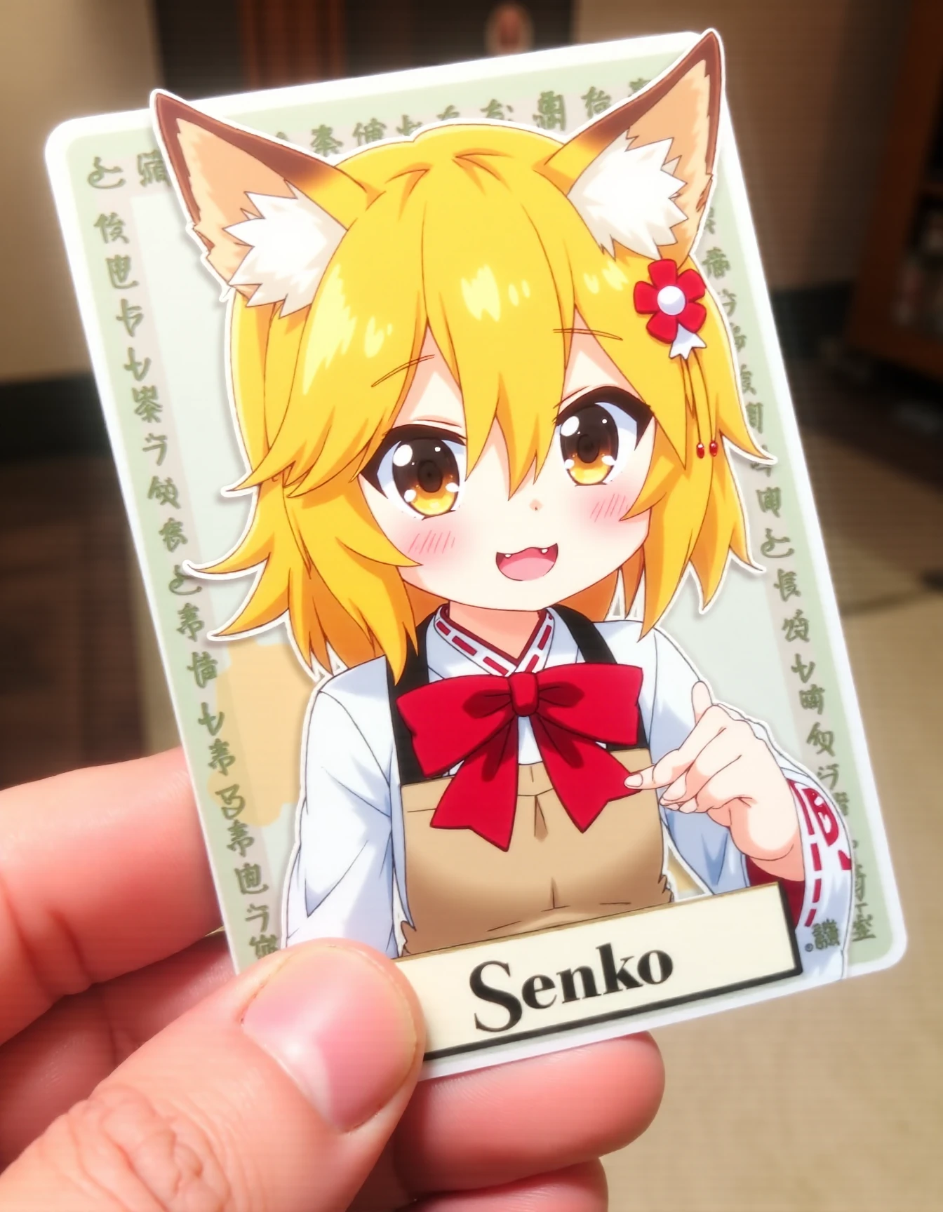 This image is a game character card for some board-like game. At the bottom there is a large label saying "Senko". Someone is holding this card.
Aanime style, featuring a young girl with fox-like characteristics.The character has short, tousled, golden-yellow hair with fox ears on top of their head, adorned with white fur inside. She have large, expressive brown eyes with a playful smile, revealing a small, sharp canine tooth. Her cheeks are slightly flushed, adding a sense of warmth and friendliness to their expression. A small, red flower with white petals is attached to her hair on the right side, adding a touch of color and detail
The character is wearing a kimono with a white base, adorned with red and black patterns. The kimono has long sleeves and is tied with a large red bow at the waist. She also wears a brown apron.
 <lora:senko_flux_v1:1>