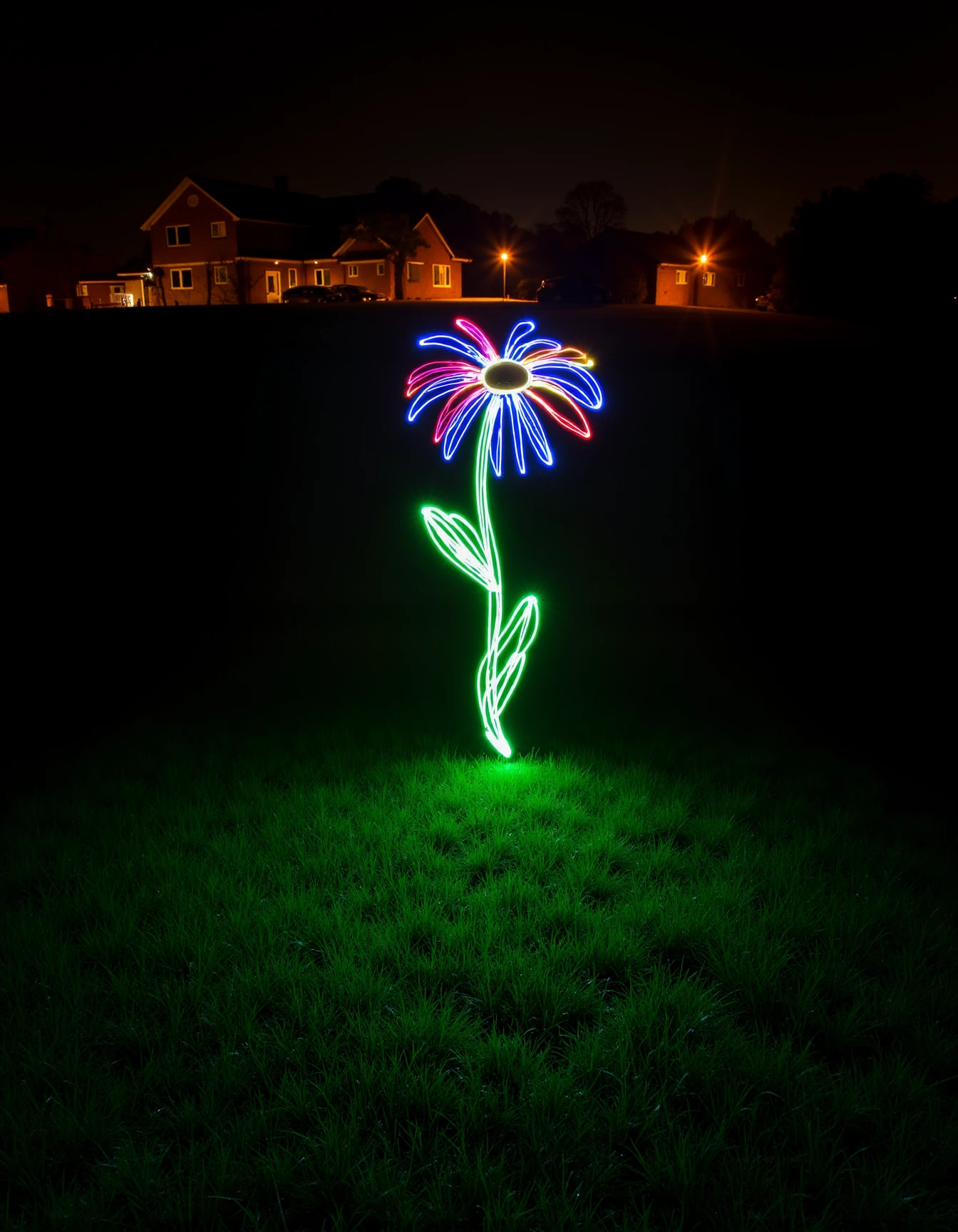 a lightPainting of a colorful flower on a green lightPainting field with a yellow lightPainting sun, detailed lightPainting scenary <lora:lightPaintingFlux:1>