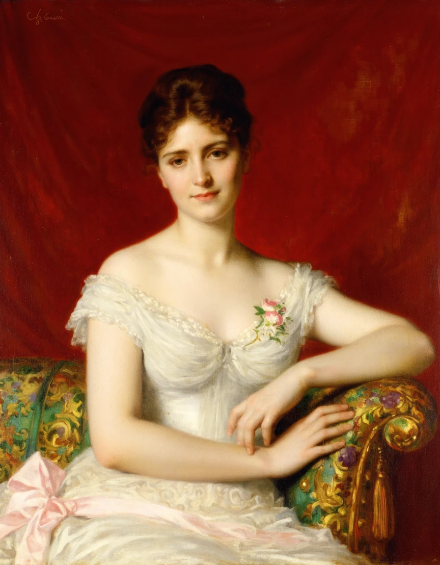 The painting by Cabanel depicts a woman in an elegant white gown with a soft pink ribbon. She sits against a deep red backdrop resting her arms on a vibrant ornate cushion. The woman's gaze is soft and contemplative and she holds a small bouquet of flowers. The composition is intimate with the woman'S face and upper body taking up the majority of the canvas while the rich colors and details in her attire and surroundings add depth and richness to the image.