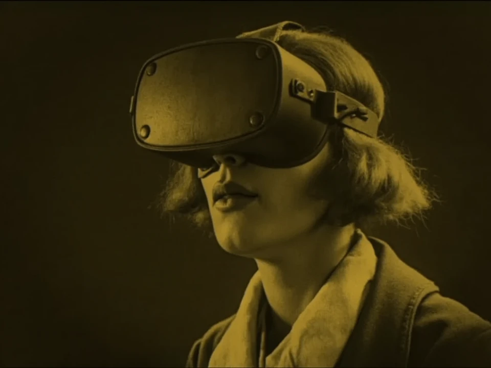 An amber tint photo of a woman wearing a vr headset