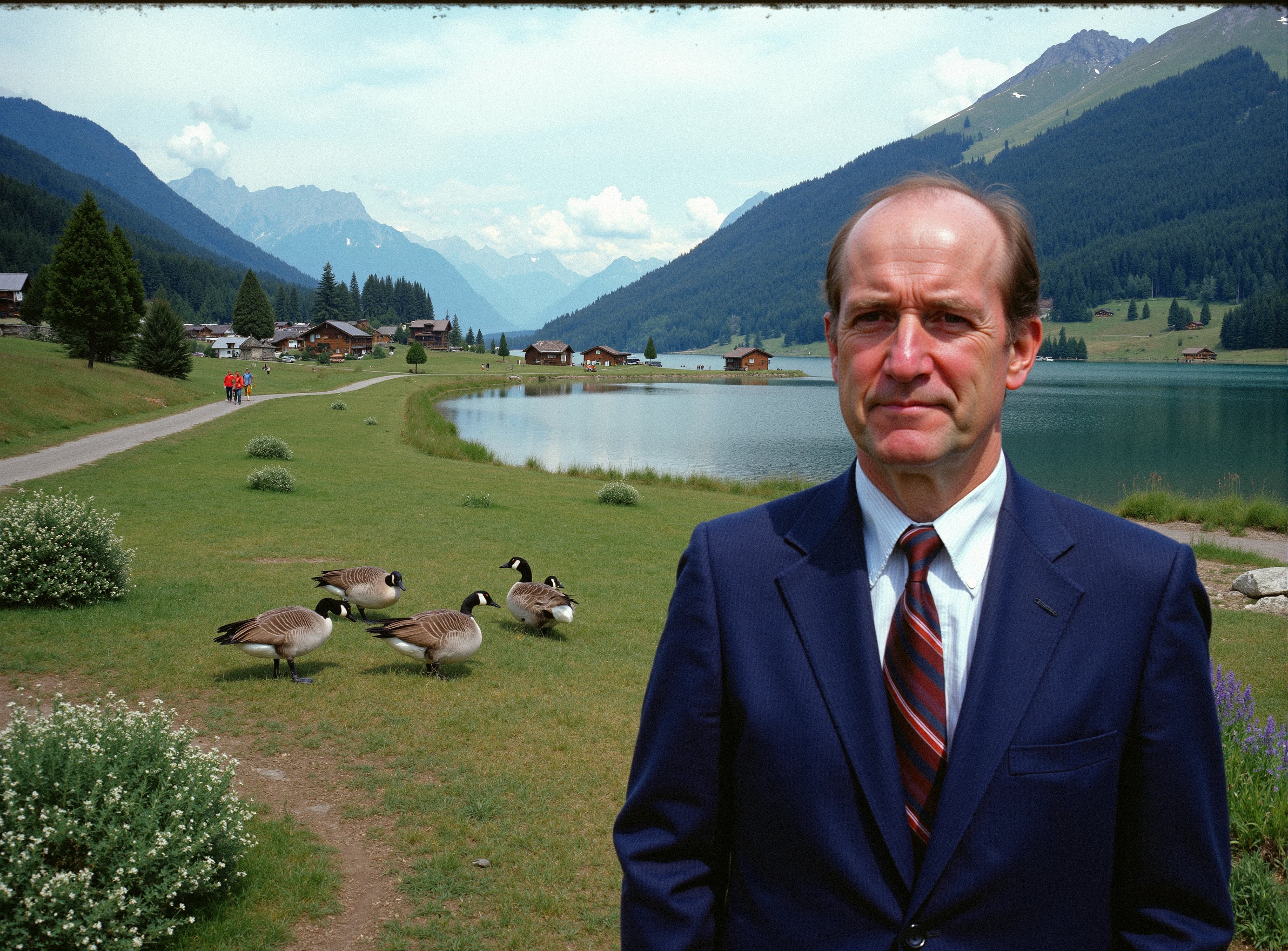 3ighti3s, closeup on a man's face in focus, he's wearing a blue suit on a valley trail, facing the camera, shot on Kodachrome film, using a 35mm sharp lens, in the background view there are cabins and a big lake with geese. Some of the geese are walking on the grass around bushes of indigenous flowers, swiss alps. rule of thirds, professionally shot photography.