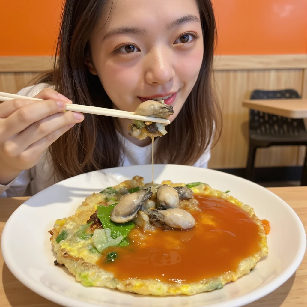 Close-up food photography of Taiwanese oyster omelette (O-a-jian), served on a white round plate, golden-green egg batter with clearly visible plump fresh oysters, vibrant green leafy vegetables scattered throughout, semi-translucent texture, bright red tomato sauce covering half the dish, glistening oysters on top. A middle-aged Asian woman in casual attire is visible from the chest up, seated at a restaurant table, leaning slightly forward with chopsticks in hand, about to take a bite of the oyster omelette. His expression shows anticipation and enjoyment. Warm lighting enhances colors and textures, shallow depth of field focusing on both the dish and the woman's face, orange-toned background suggesting restaurant setting, high-resolution image capturing intricate details of the food and the diner's interaction with it