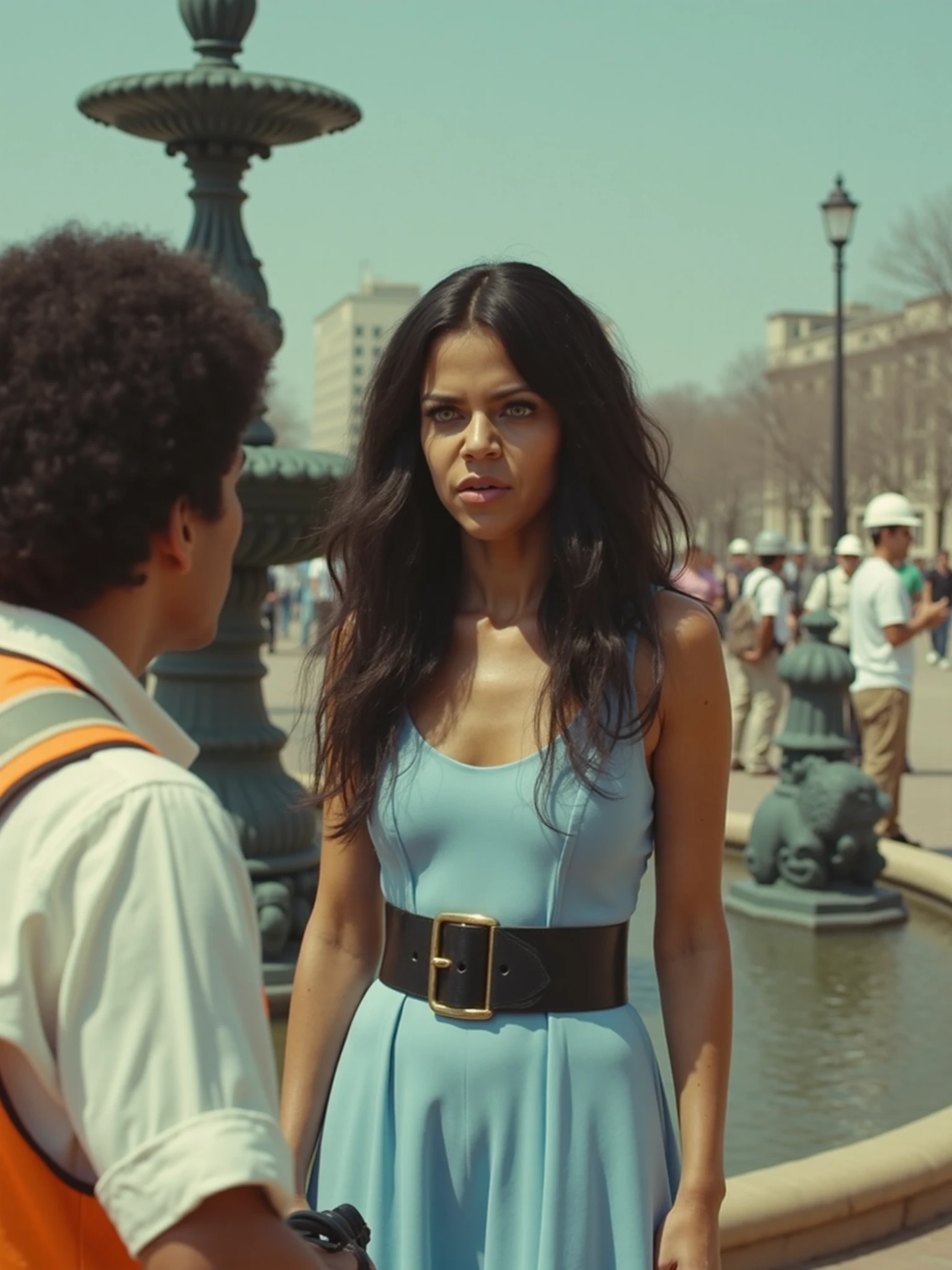  retro filter,  woman k4tl1n,film grain, kaitlin olson, she is very tan, tan skin, very  heavy makeup, she is wearing a light blue dress, a wide black belt, she has long curly black hair, she is interviewing a  construction worker in front of a fountain in a city , , 