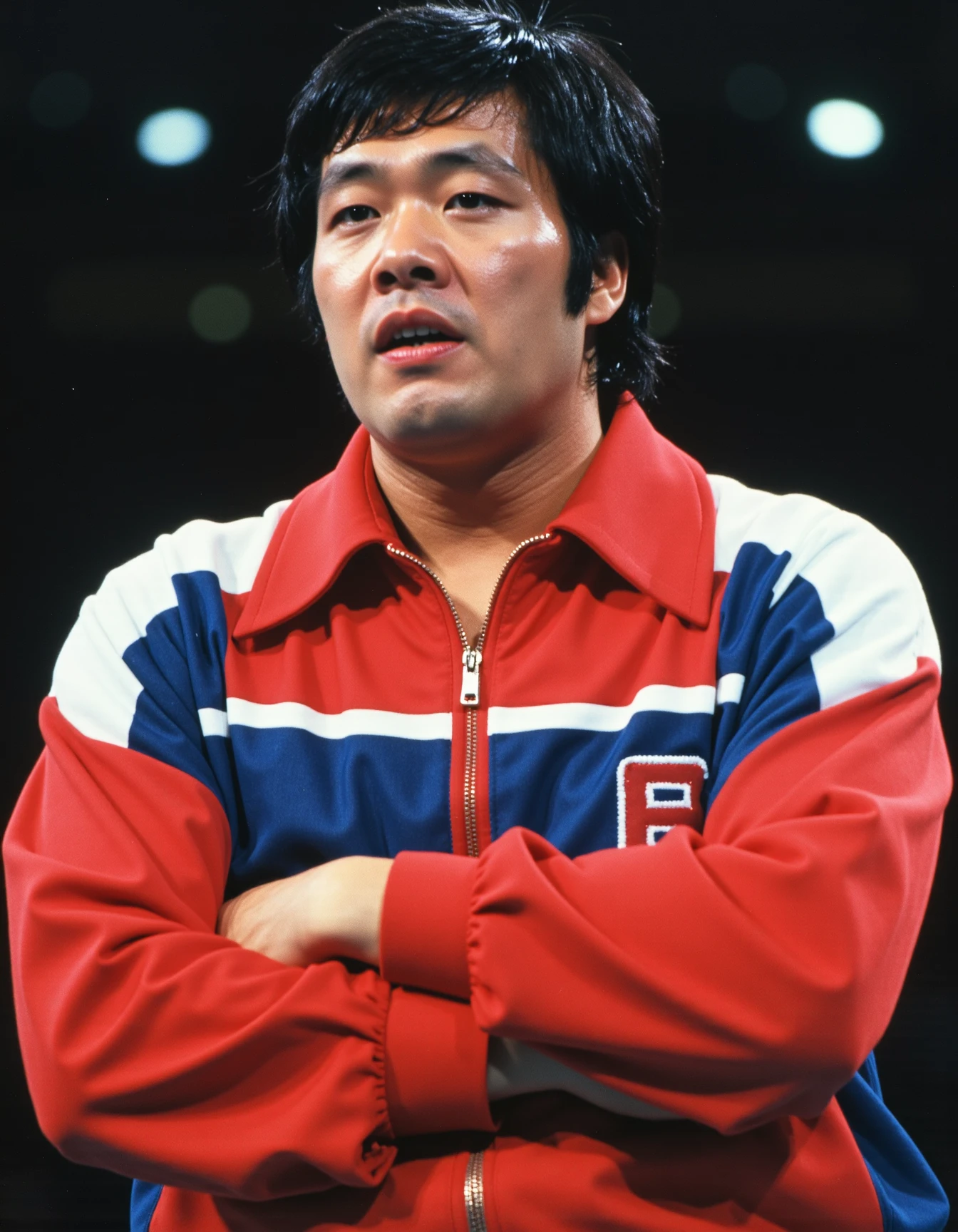 epic cinematic shot of dynamic this is Jumbo Tsuruta with his arms crossed wearing a red and blue jacket with a white stripe.   in motion. main subject of high budget action movie. raw photo, motion blur. best quality, high resolution