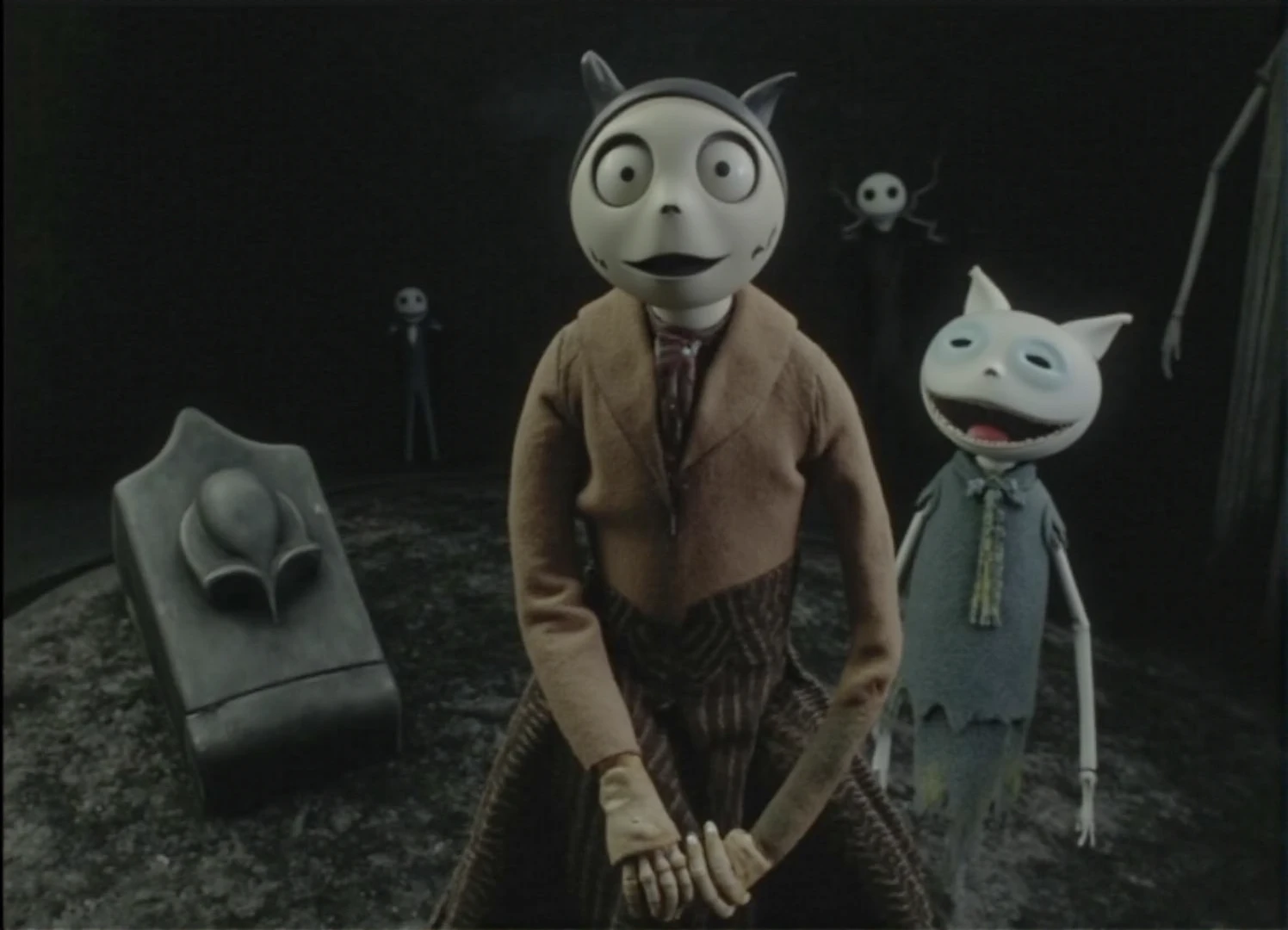 Stop motion film showing cat puppet at the cemetery   in style of Tim Burton. Nightmare before Christmas movie. Some monsters at background.", "t5xxl": "Stop motion film showing cat puppet at the cemetery   in style of Tim Burton. Nightmare before Christmas movie. Some monsters at background.