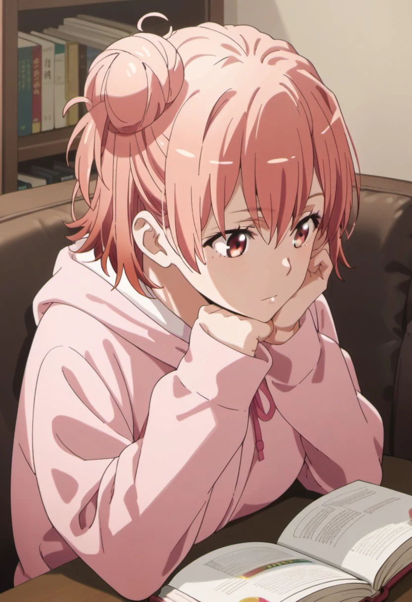 score_9, score_8_up, score_7_up, source_anime, yuigahama yui, pink hair, single hair bun, short hair, red eyes, 1girl, solo, hood, hair bun, head rest, reading, hoodie, indoors, book, hooded sweater, hood down, closed mouth