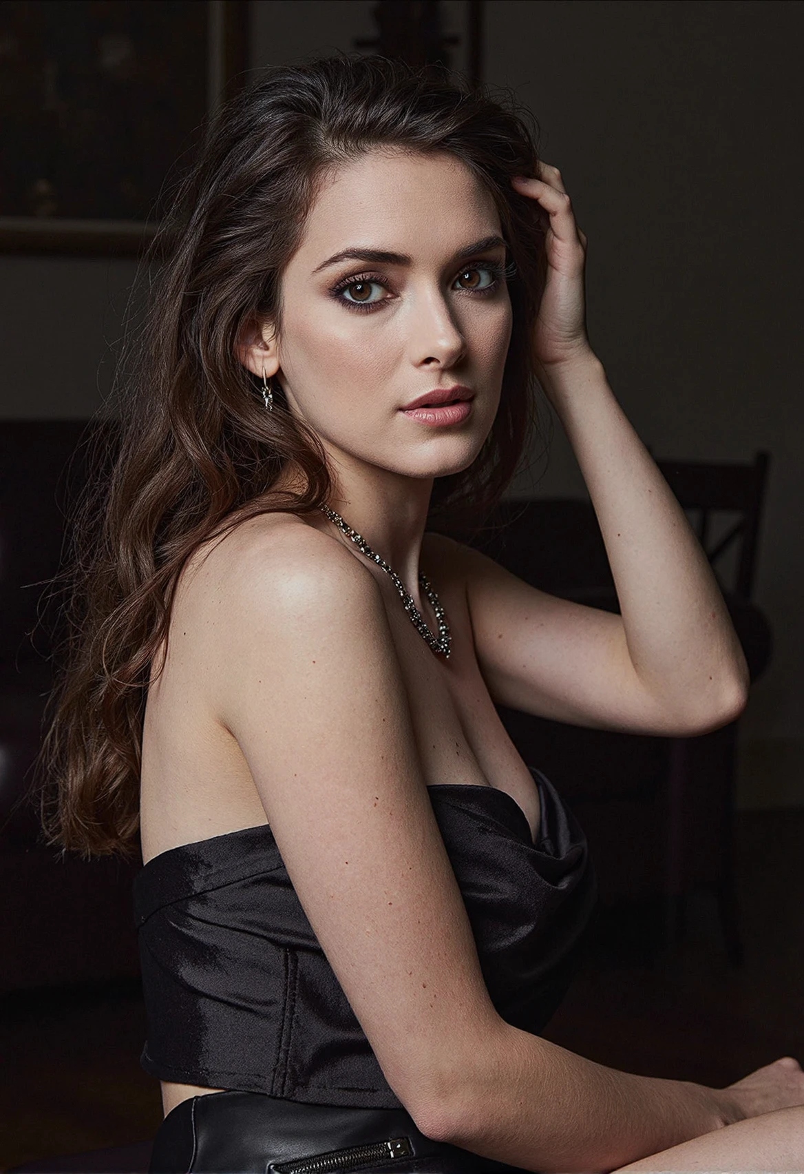 Realistic photo of a beautiful 4ng3l1n4j-v2 woman,  long hair, looking at viewer, multiple girls, brown hair, dress, 2girls, bare shoulders, jewelry, earrings, solo focus, blurry, black dress, lips, hand on hip, strapless, depth of field, blurry background, strapless dress, realistic, soft lighting, professional Photography, Photorealistic, detailed, RAW, analog, sharp focus, 8k, HD, DSLR, high quality, Fujifilm XT3, film grain, award winning, masterpiece<lora:4ng3l1n4j-v2:1.0><lora:4ng3l1n4j-v2:1.0><lora:4ng3l1n4j-v2:1.0>