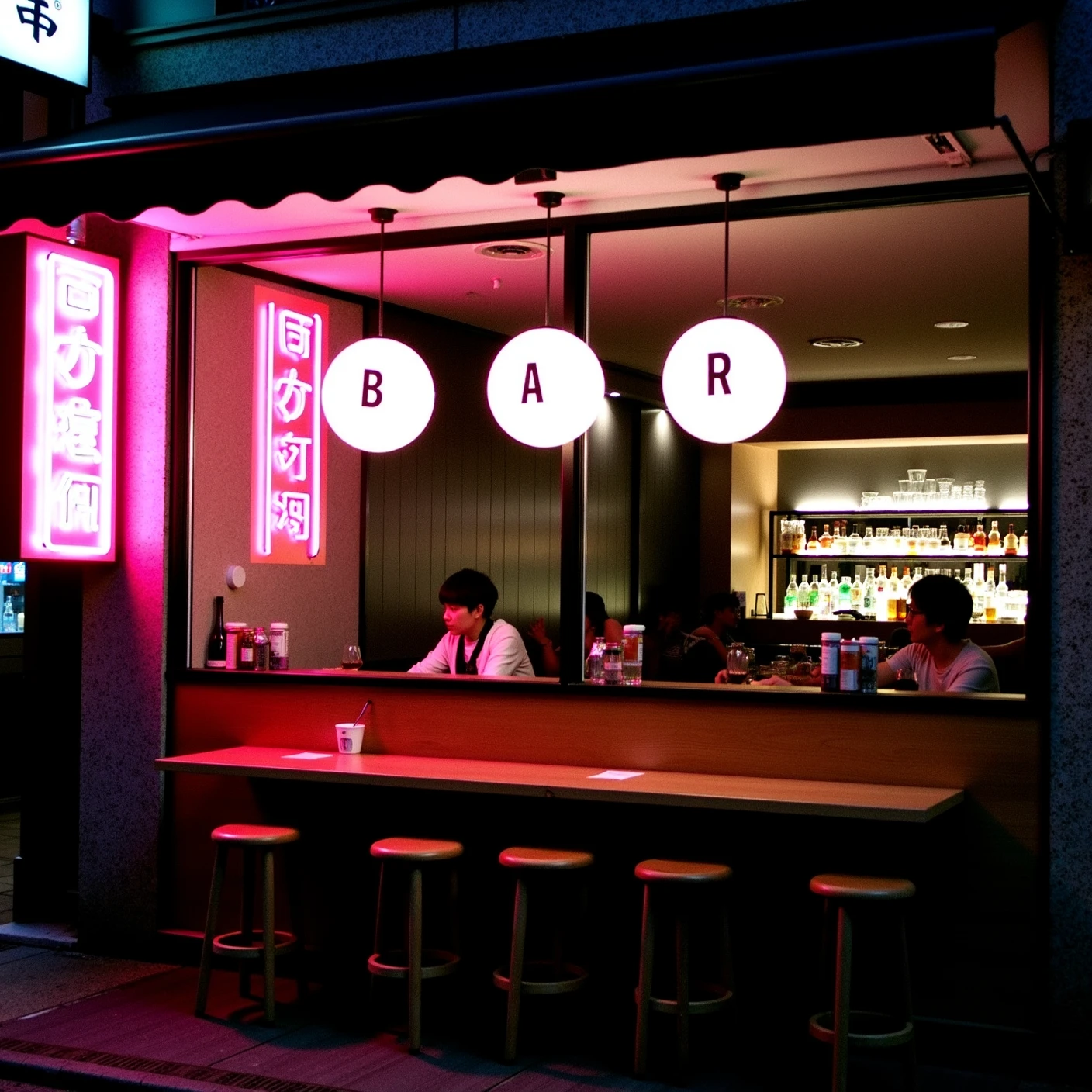 a photograph with coarse film grain presents a captivating nighttime scene of a Japanese-style bar, where the exterior façade seamlessly transitions into an intimate dining experience within. The setting is illuminated by soft, ambient lighting that casts a warm glow over the space.
In the foreground, a striking neon sign stands out against the dark background. Below this, the word "BAR" is emblazoned across three white circles suspended from above, creating an eye-catching visual display. The color palette of the image is characterized by rich tones of black, brown, and gray, punctuated by pops of vibrant pink.
Through a large window that spans the length of the building, the interior of the bar is visible, offering a glimpse into the bustling activity within. A row of stools lines one side of the room, while a wooden counter stretches along the opposite wall, where patrons can sit and enjoy their drinks. Behind the counter, rows of bottles and glasses are neatly arranged on shelves, adding to the cozy atmosphere.
The overall effect of this image is one of understated elegance, as if the viewer has stumbled upon an unassuming gem in the heart of Tokyo's bustling streets. The harmonious blend of modern and traditional elements creates a unique ambiance that invites the observer to step inside and immerse themselves in the experience.