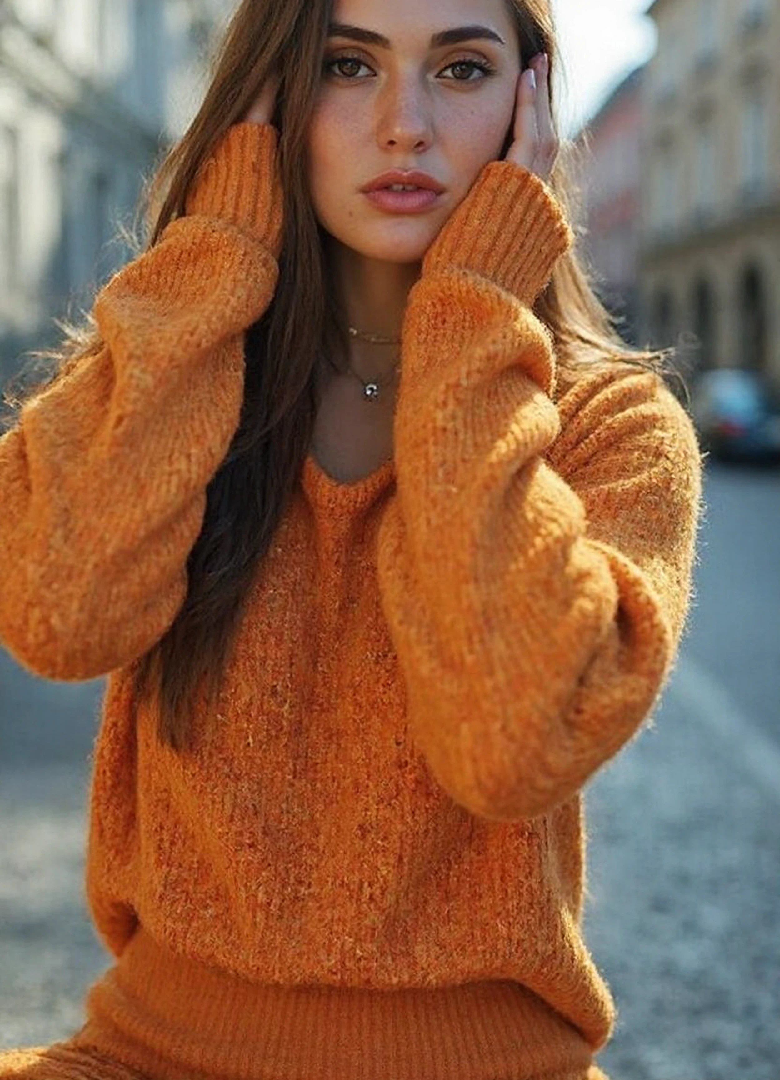 a beautiful woman, form fitting sweater outfit create a dynamic interplay with the environment, emphasizing her sleek presence. The background allows the viewer to focus on eye-catching fashion, Captured with a Sony A7R IV camera and a 50mm f/1.2 G Master lens for a beautiful editorial shoot, this composition highlights a fashion-forward aesthetic. Inspired by avant-garde fashion photography from Sølve Sundsbø, this image blends contemporary fashion and elegance, high-fashion vision, evoking a sense of glamorous nostalgia. The camera angle is from a low angle, paired with a medium format film camera to enhance the intimate and timeless quality. In the style of Sally Mann.