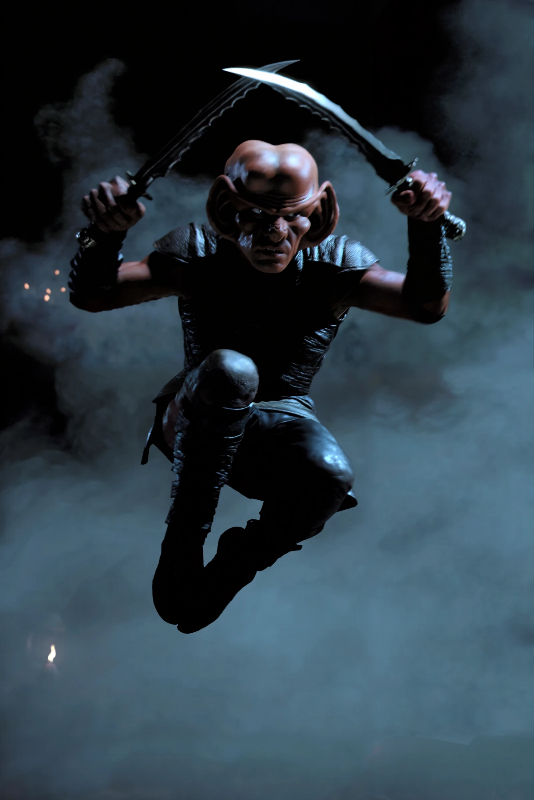 A ferengi assassin, shrouded in shadows, leaps through the air. His hands, gripping twin, curved daggers, are a blur as he slices through the air, moving with lethal precision. His angular face is set in a cold, calculating expression, lips pressed into a thin line as he executes his deadly maneuver. His dark leather armor clings tightly to his lithe form, almost blending into the surrounding darkness, while the sharp edges of his blades catch the faint, flickering light of a distant torch. Sweat glistens on his brow, and thereâs a glint of something predatory in his eyes. Behind him, faint, swirling wisps of magical darkness seem to follow his movements, almost as if the shadows themselves obey his command. His body is perfectly poised, frozen in mid-air, as the moment of his strike draws near.