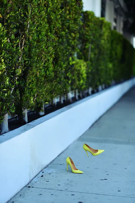 A world where woman high heels and shoes start to walk by themselves, as if an invisible nude woman were wearing them