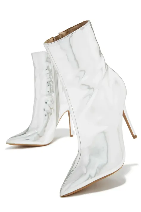A world where woman high heels and shoes start to walk by themselves, as if an invisible nude woman were wearing them