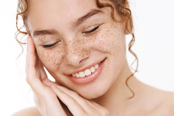 Before and after using AI blemish remover