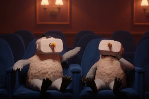 ตัวละครนกสองตัวนั่งอยู่ในโรงภาพยนตร์