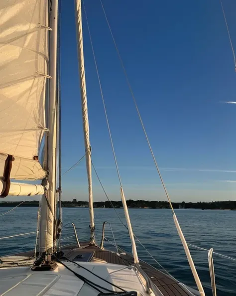 Masterpiece, best quality, ultra high res, absurdres, 4k, 8k, Raw photo, Nikon D850, backlight, rimlight, bright sunlight, film grain:1.2, (warm hue, warm tone:1.2), (color photo), sail boat